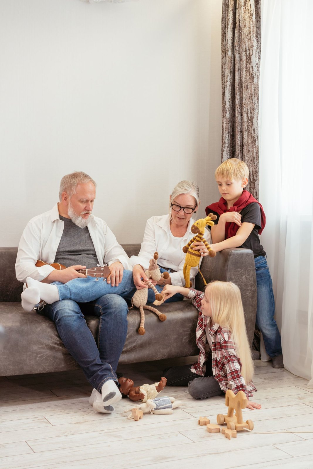 Grandparents and children playing together