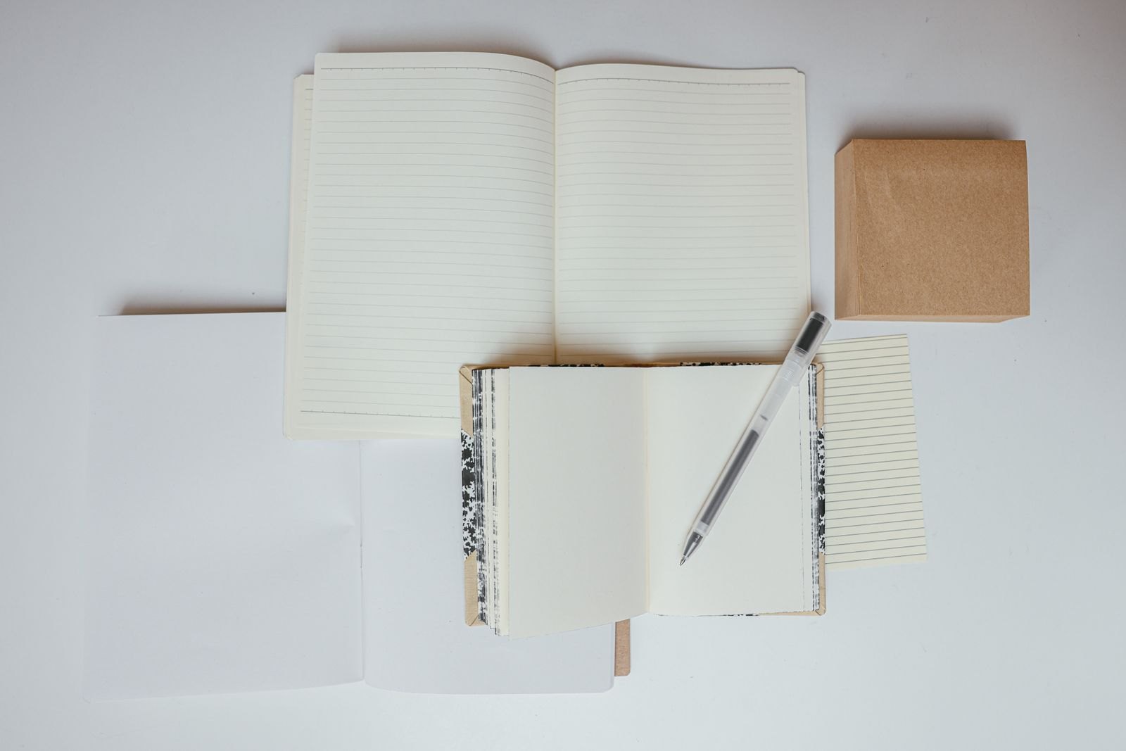 Close up shot of a pen on a notebook