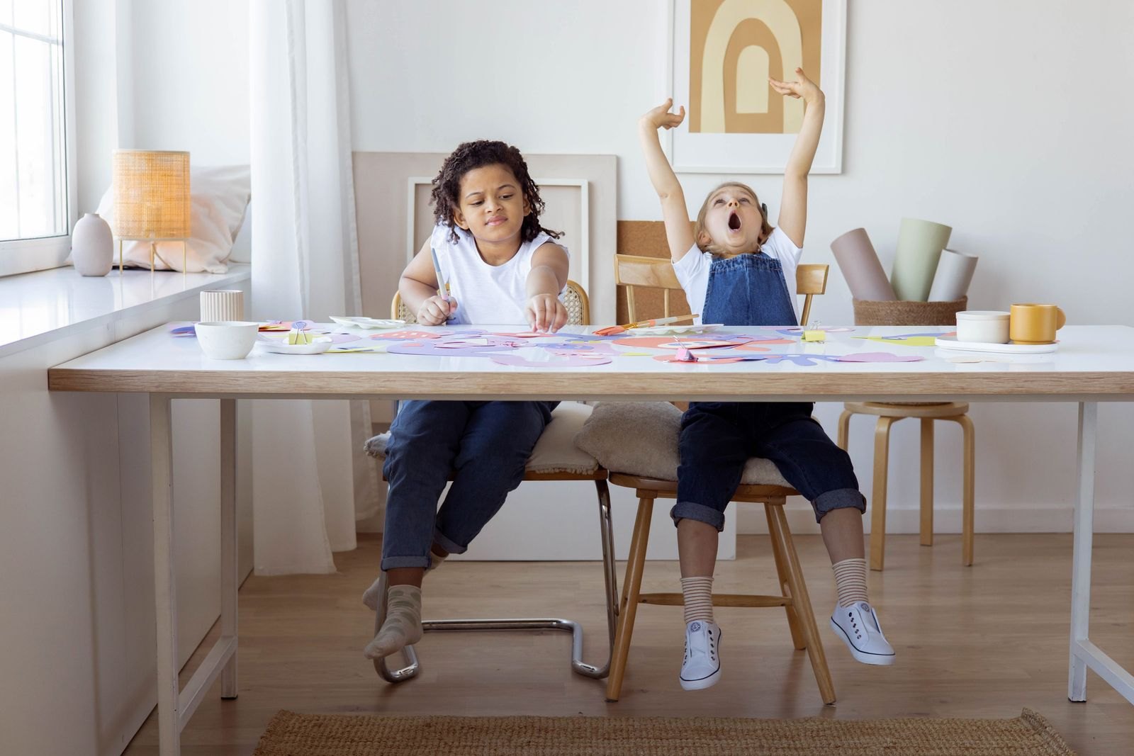 Two kids doing some artworks