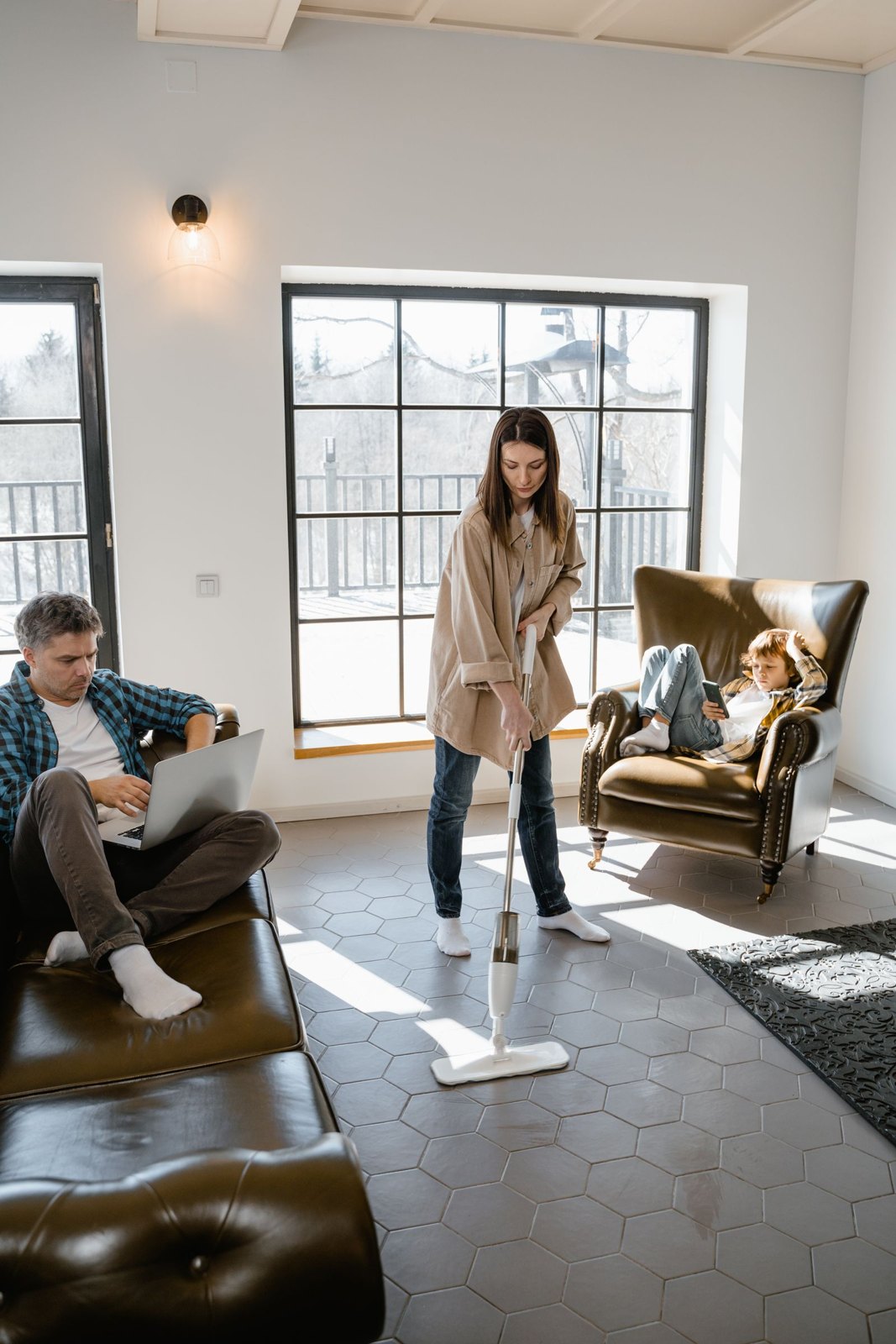 A mom wiping the living room floor